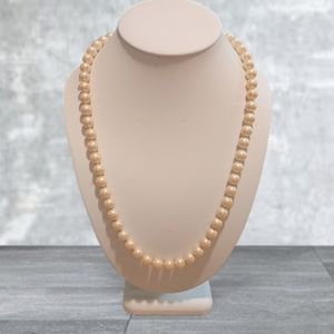 Vintage Genuine Pearl Strand With  Gold Plated Flower Carved Closure.